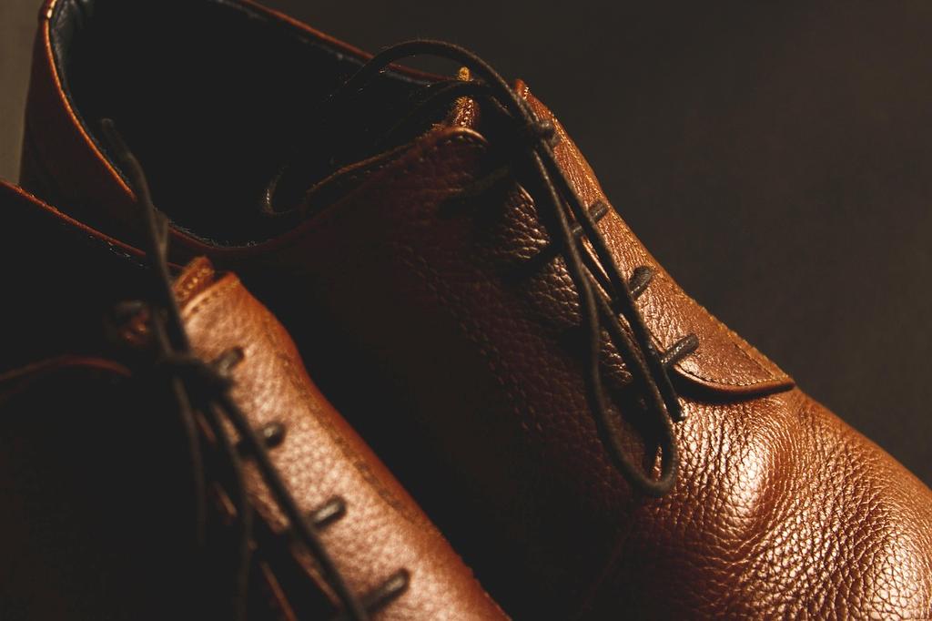 Multi-Tier Shoe Rack made of bamboo for compact entryways